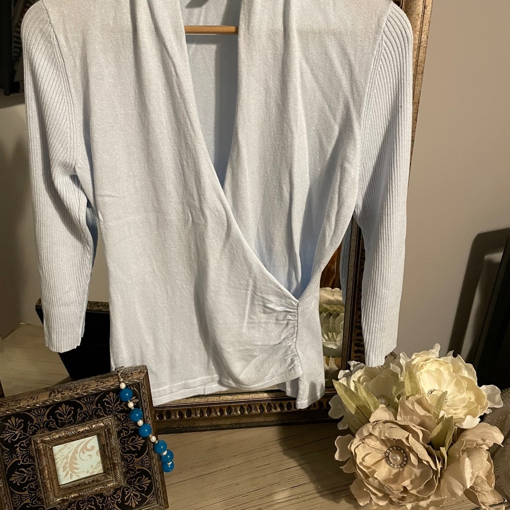 light blue sweater